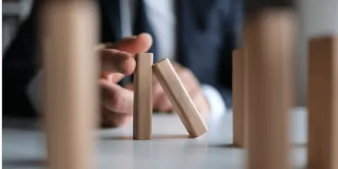 Man playing dominoes